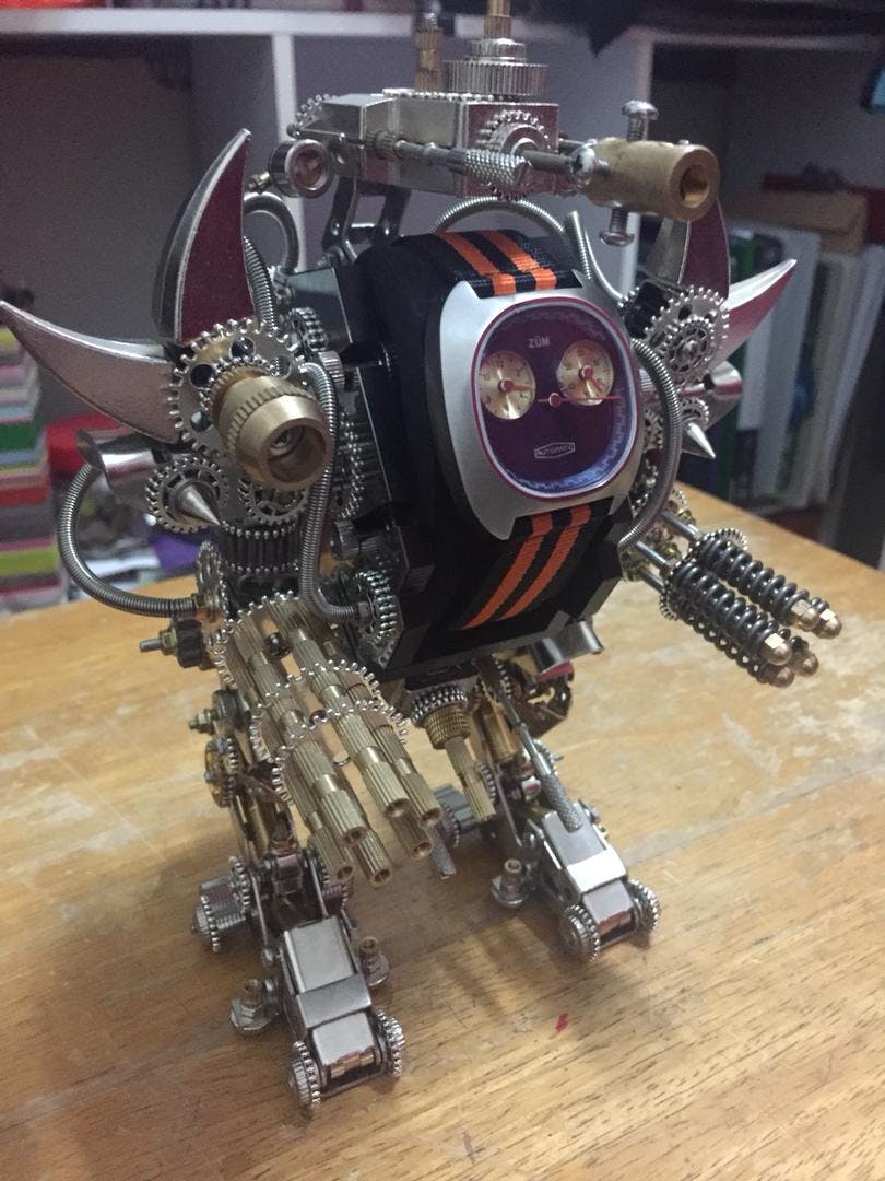 Taurus Robot Watch Stand Holder 3D Assembly Metal Fighting Mecha Action Figure for Clock Collector photo review